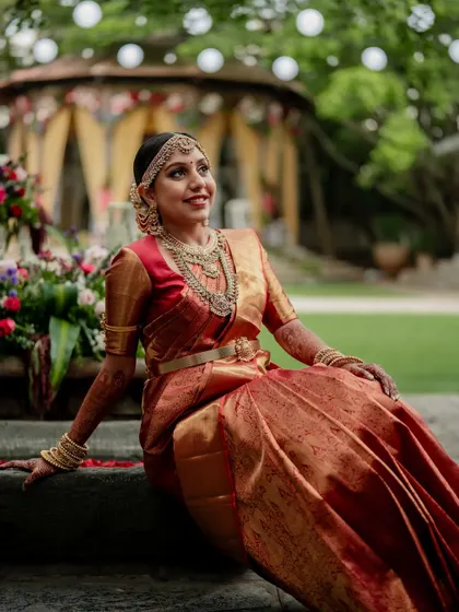 A moment of quiet connection amidst the grandeur of The Tamarind Tree. We love using the venue's stunning architecture to frame our couples, creating a story of romance and tradition.