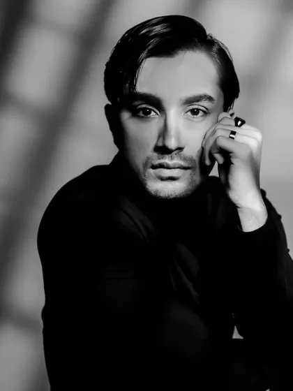 Another angle of the black turtleneck look, playing with light and shadow.