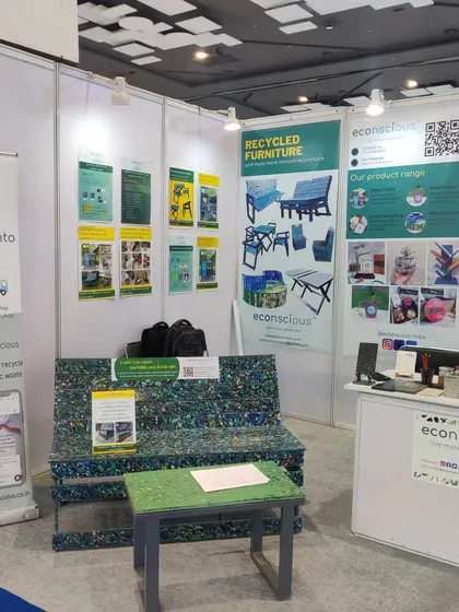 Our full display at the Pragati Maidan exhibition, showcasing our range from small decor items to large furniture pieces. The bench always draws attention with its vibrant, confetti-like appearance.