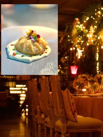 A close-up of the bespoke decor for the celebrity birthday dinner, showing a puff pastry dish set against the beautifully decorated private dining area.