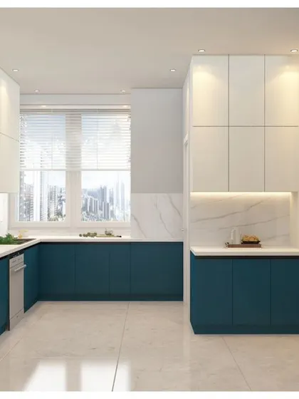 Another view of the U-shaped teal and white kitchen, highlighting the ample counter space and storage. The design includes a window for natural light, making the space feel bright and welcoming.