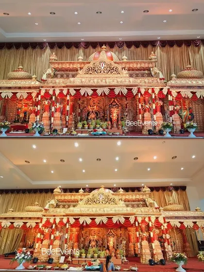 A two-panel collage showing the grand wedding mantap from different angles. This highlights the consistency and grandeur of the design from every viewpoint.