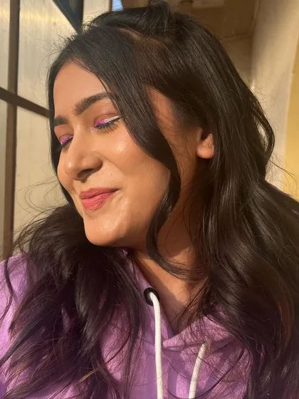A full view of the gradient liner look, showing how it adds a fun and creative element to an otherwise simple makeup style. It is all about having fun with your skills.