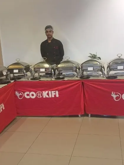 A full view of our extensive buffet line, ready to feed a hungry crowd at a house party.