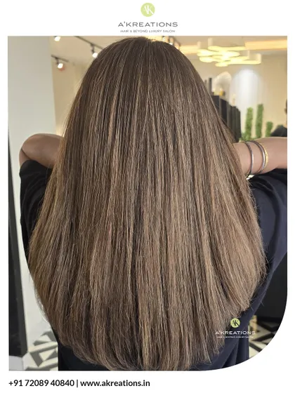 A perfect blend of beige, ash, and brown tones for a sophisticated and multi-dimensional hair color, finished with a sleek, straight style.