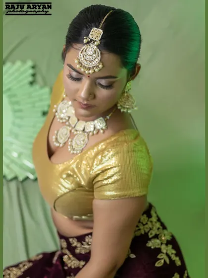 A soft, elegant pose from the same 'Heeramandi' set. This image shows a different, more contemplative side of the character we created, demonstrating versatility within a single themed shoot.