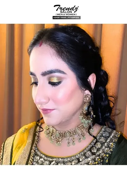 A closer view of the Karwa Chauth makeup. The metallic eyeshadow is the star of the show, complemented by glowing skin and a soft pink lip.
