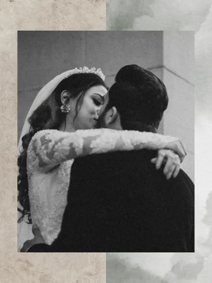 A close-up, black and white shot of the couple sharing a kiss. This timeless style emphasizes the emotion and intimacy of the moment.