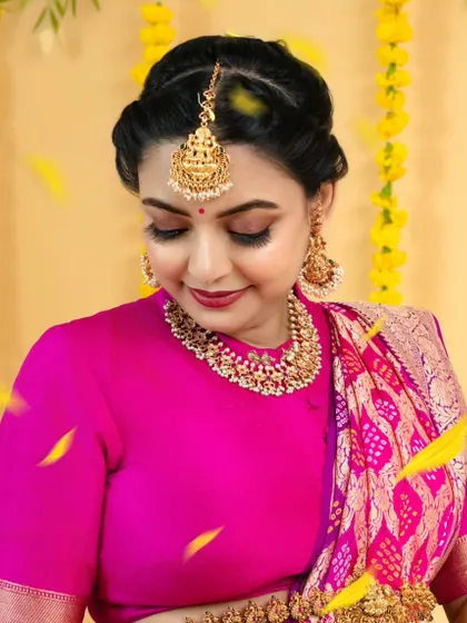 The soft, glowing makeup enhances her natural beauty without hiding it.