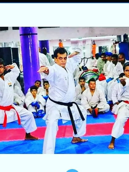 My guru, Hanshi Bharat Sharma Sir, leading a training session. His direct instruction in fundamental stances and techniques forms the core of our academy's success.