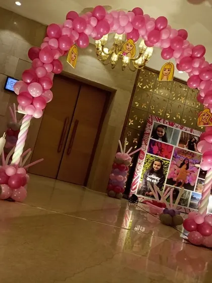 The entrance to Vanya's Barbie world. A beautiful pink balloon arch welcomes guests into the party hall, setting the magical tone right from the start.