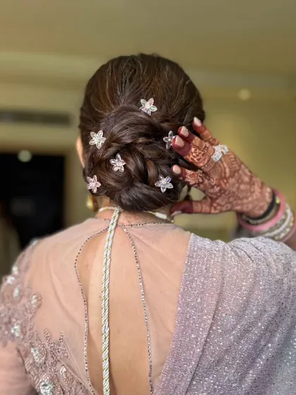 Another view of the intricate hairstyle, which is both beautiful and secure.