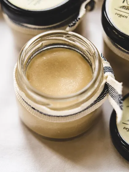 A freshly opened jar of my vegan natural deodorant. The texture is smooth and creamy, making it easy to apply. It's a worry-free solution for staying fresh.