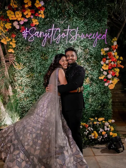 The happy couple sharing a hug at their sangeet. The bride's sparkling lehenga and my soft glam makeup ensure she shines brightly all night.