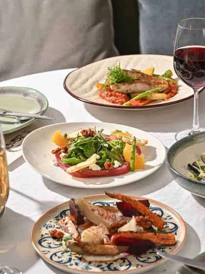 A table set for a feast, showcasing the variety of my new menu. There's something for everyone to enjoy.