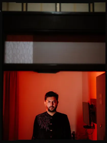 Duplicate of image 415, an artistic groom portrait.
