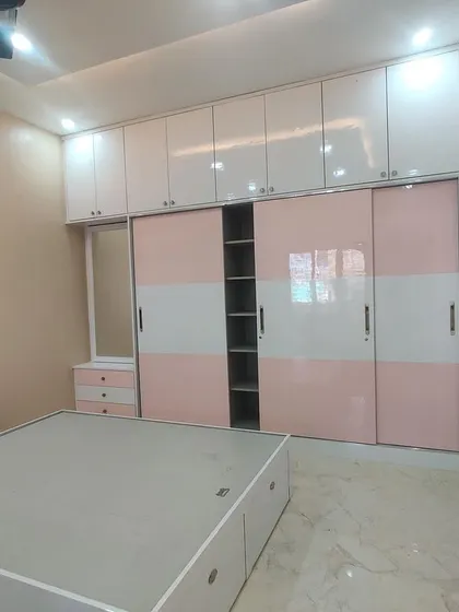 Another view of the sliding wardrobe, showing the smooth mechanism and clean finish. This modular solution was manufactured in our FURNCO factory.