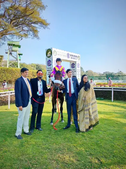 El Rey, with jockey David Allan, poses with the Queen's Gambit Racing Syndicate.