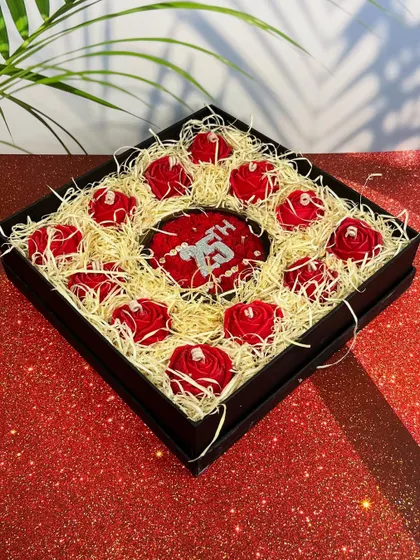 Another view of the 25th-anniversary gift box, highlighting the intricate detail of the wax roses and the personalized centerpiece. This is a great example of a luxurious and heartfelt gift for a special couple.