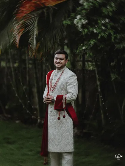 A duplicate of the groom's full-length portrait in his wedding sherwani.