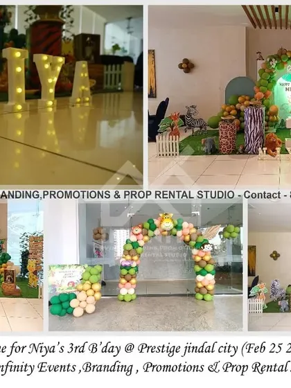 A "Wild Three" safari theme for a 3rd birthday at Prestige Jindal City. The decor includes a semi-arch backdrop with a balloon garland, animal-print cylinder props, and a light-up number "3," perfect for a little adventurer.