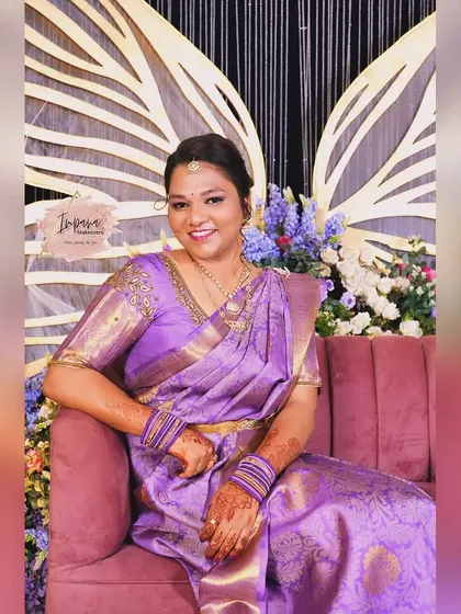 A happy portrait of the bride-to-be. Her makeup is flawless, and her smile is the best accessory.