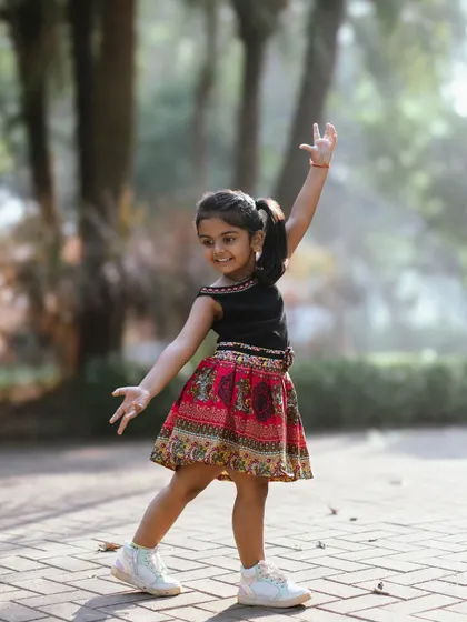 A moment of dance and pure expression during her fourth birthday shoot. I let her guide the session, and her ideas led to the most authentic and beautiful photos.