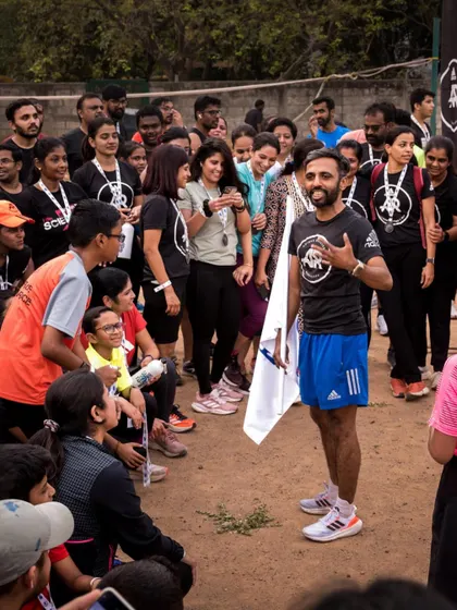As a coach, my greatest joy is sharing my knowledge and passion with the community. Here I am breaking down a workout for the group.