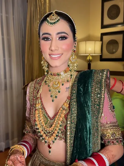 A final portrait of the bride, looking absolutely perfect. The makeup enhances her natural beauty and gives her a stunning bridal glow.