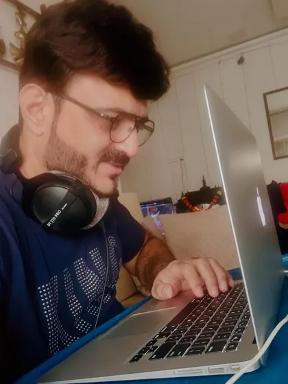The work starts long before the party begins. Here I am at home, preparing my set and curating the perfect playlist for an upcoming event.