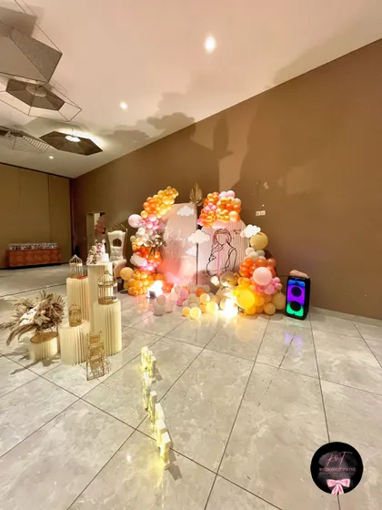 A full-room view of the baby shower setup, showing how I can transform a venue space into a beautiful, celebratory environment.