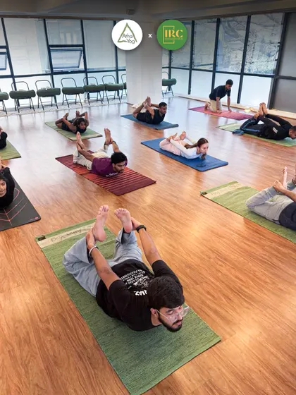 Participants in Dhanurasana (Bow Pose) during our session with the Indiranagar Run Club. This pose is excellent for stretching the entire front of the body and strengthening the back muscles.
