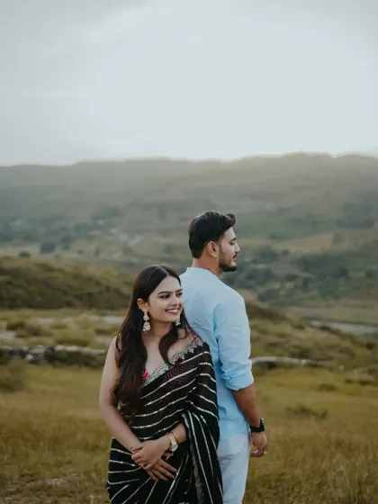 A lovely portrait with the rolling hills of Udaipur in the background. The soft, natural light is perfect for creating flattering and romantic pre-wedding images.