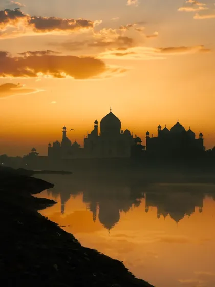 The Taj Mahal at sunrise is a sight that never gets old. For me, travel photography is about finding that perfect light and unique angle to capture the feeling of a place. This shot, with its warm glow and reflection, is a memory I'll always cherish.