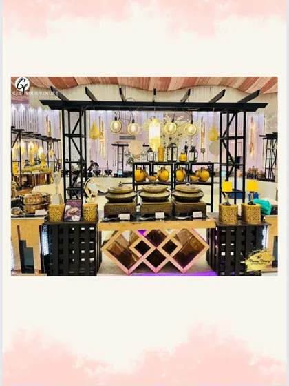 A different style of buffet setup, with a mix of black iron-work and wooden crates, offering a rustic yet sophisticated look.