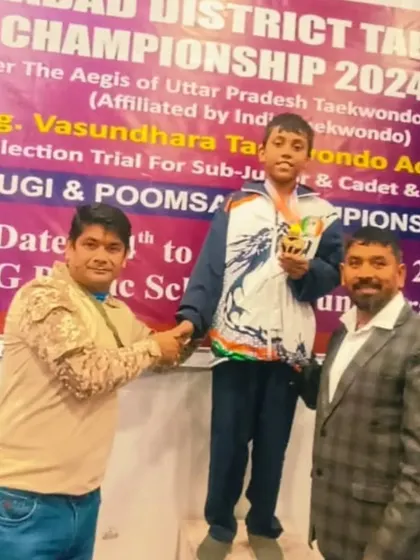 Another one of my champions receiving his medal. His performance at the district level was excellent.