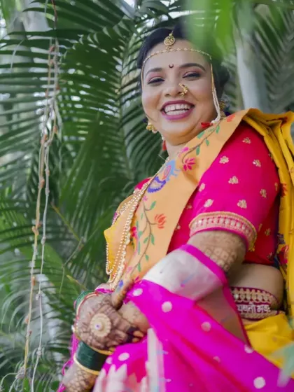 A moment of pure, uninhibited laughter from the bride. These are the candid shots that truly capture the spirit of the day.