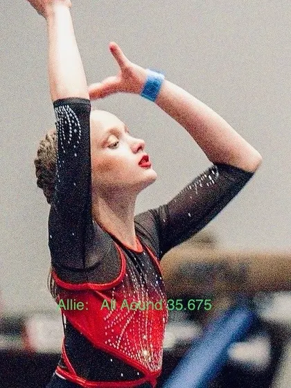 A close-up of our Level 7 gymnast Allie, showing her focus and artistry during a routine.