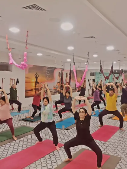 The energy in a full class is incredible. This is a snapshot of our group moving together, finding individual focus while sharing a collective positive vibe in our Noida studio.