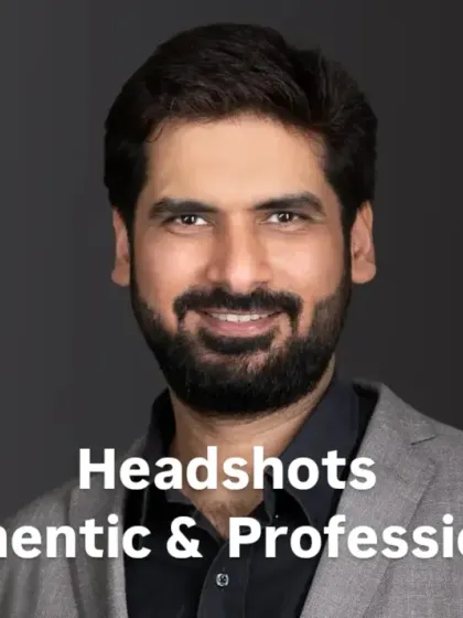 This studio headshot combines a textured grey backdrop with soft lighting to create a warm and inviting portrait. It shows that a professional image can also be full of personality and genuine warmth.