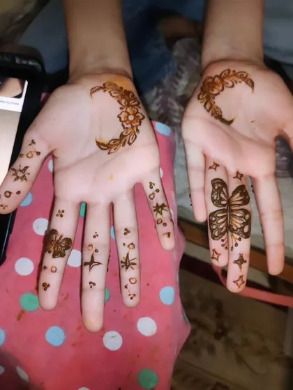 A fun and whimsical design with moons, stars, and butterflies. Perfect for younger clients or those who want something playful.