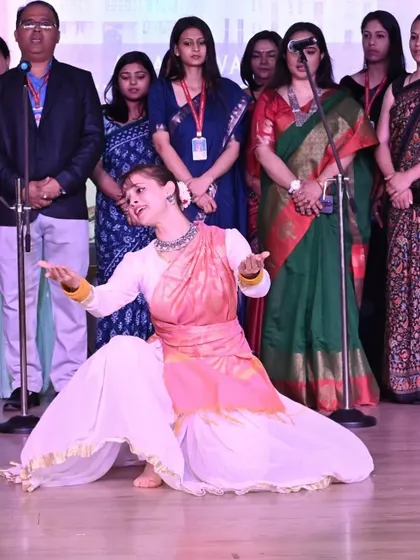 A moment of expression from a live stage performance. I teach my students and clients how to use their whole body, including facial expressions, to convey the story of the song.