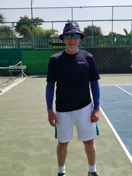 Coach Nelson on the court at one of our partner facilities. We ensure our players get direct exposure to the people who make decisions in college tennis.
