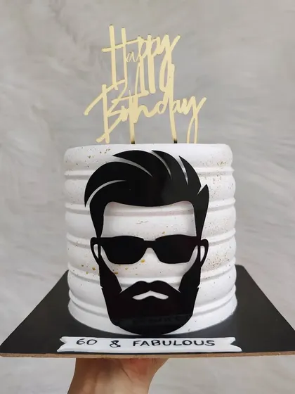 A cool cake for a beard lover turning 60. The design features a stylish beard and sunglasses silhouette, proving you can be fabulous at any age.