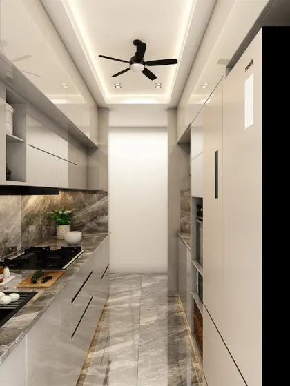 This view of the galley kitchen highlights the efficient layout, with ample storage and countertop space on both sides, perfect for compact homes.