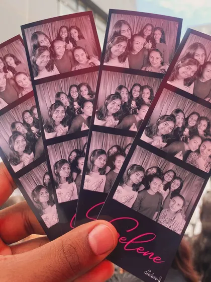 A handful of photo strips with a pink tint and a custom "Selene" logo. I can add color overlays to match your event's theme.