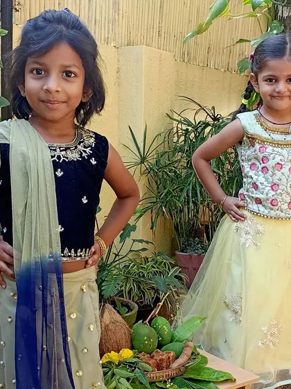 Two girls looking lovely in their festive outfits.