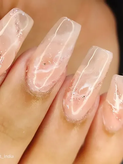 A throwback to this acrylic extension work from 2022. A beautiful clear nail with a pink marble effect.