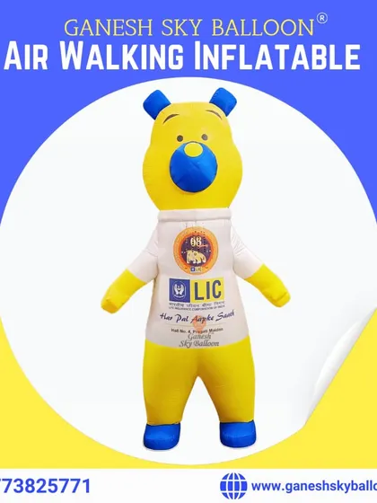 A clean product shot of the LIC walking inflatable bear mascot. This shows the final product clearly, highlighting the branding and friendly design.