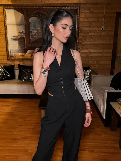Another angle of Atisha's power glam. The clean lines of the makeup and hair create a look that is incredibly sophisticated and modern.